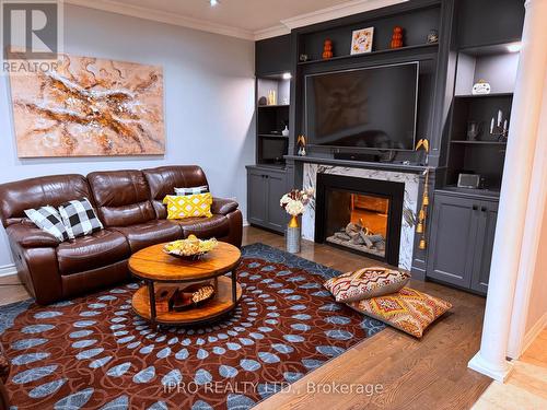 27 Tysonville Circle, Brampton, ON - Indoor Photo Showing Living Room With Fireplace