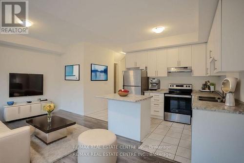 10 - 60 Cosmopolitan Common Street, St. Catharines, ON - Indoor Photo Showing Kitchen With Double Sink