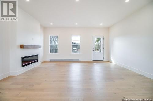 122 Glennorth Street, Fredericton, NB - Indoor Photo Showing Living Room With Fireplace