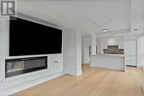 406 - 3 Southvale Drive, Toronto, ON - Indoor Photo Showing Kitchen With Fireplace