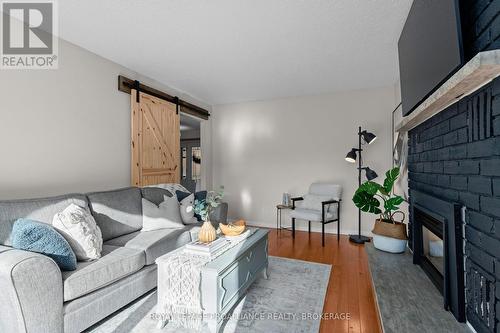 953 Alpine Court, Kingston (North Of Taylor-Kidd Blvd), ON - Indoor Photo Showing Living Room With Fireplace