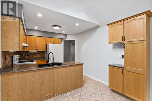 21 Caleche Avenue, Clarington, ON - Indoor Photo Showing Kitchen With Double Sink