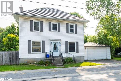 Colonial-style house with a garage and an outdoor structure - 48 North Trent Street, Frankford, ON - Outdoor