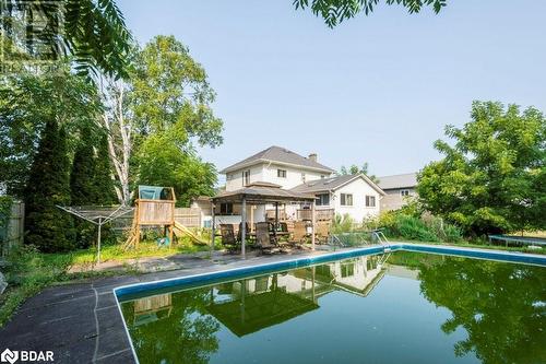 View of pool featuring a gazebo and a playground - 48 North Trent Street, Frankford, ON - Outdoor With In Ground Pool With Backyard