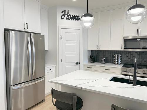 66 Marquis Crescent, Brandon, MB - Indoor Photo Showing Kitchen