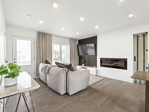 Salon - 3980 Crois. Bazin, Brossard, QC - Indoor Photo Showing Living Room With Fireplace