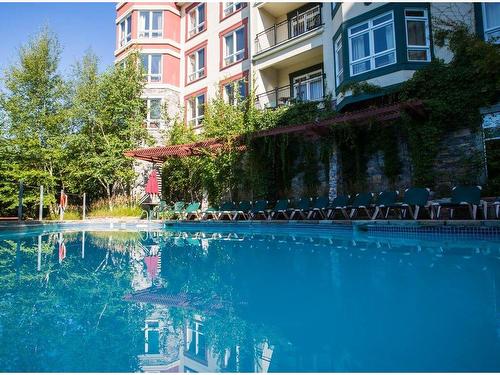 Piscine - 527D-150 Ch. Au Pied-De-La-Montagne, Mont-Tremblant, QC - Outdoor With In Ground Pool With Balcony