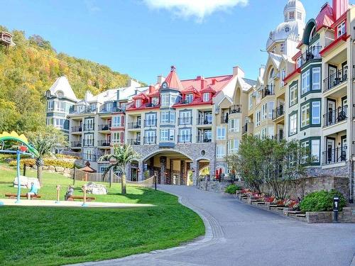 Face arriÃ¨re - 527D-150 Ch. Au Pied-De-La-Montagne, Mont-Tremblant, QC - Outdoor With Balcony With Facade