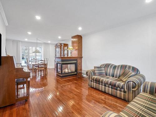 Living room - 1269 Boul. Céloron, Blainville, QC - Indoor Photo Showing Living Room With Fireplace