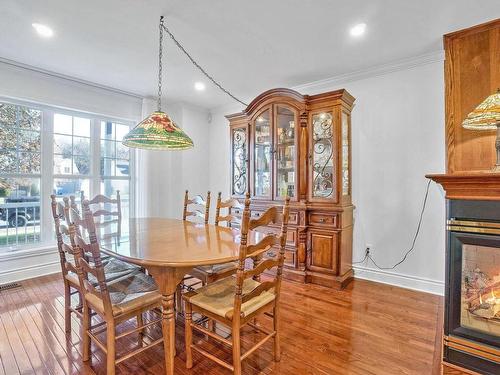 Family room - 1269 Boul. Céloron, Blainville, QC - Indoor Photo Showing Dining Room With Fireplace