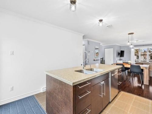 Cuisine - 300-4 Rue Gratton, Sainte-Thérèse, QC - Indoor Photo Showing Kitchen With Double Sink