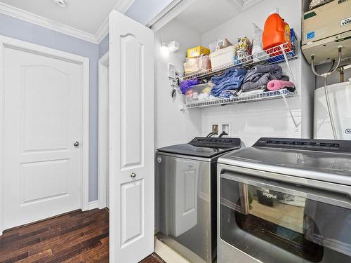 Salle de lavage - 300-4 Rue Gratton, Sainte-Thérèse, QC - Indoor Photo Showing Laundry Room