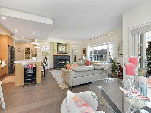 207-9861 Third St, Sidney, BC - Indoor Photo Showing Living Room With Fireplace