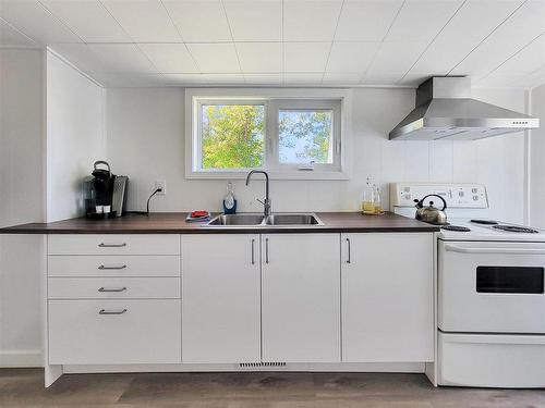 248 Government Road, Keewatin, ON - Indoor Photo Showing Kitchen With Double Sink