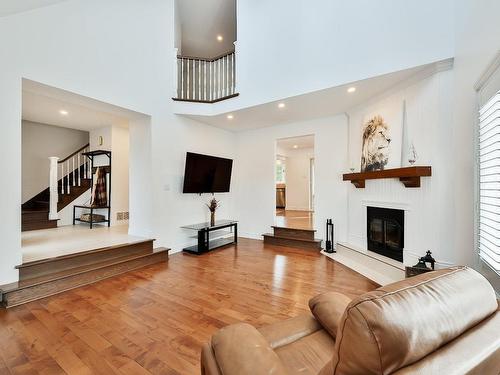 Salon - 139 Boul. Du Val-D'Ajol, Lorraine, QC - Indoor Photo Showing Living Room With Fireplace