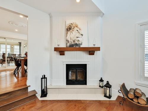 Salon - 139 Boul. Du Val-D'Ajol, Lorraine, QC - Indoor Photo Showing Living Room With Fireplace