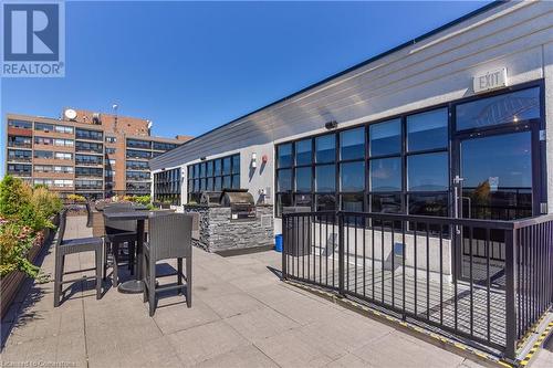 View of patio featuring an outdoor kitchen and a grill - 112 Benton Street Unit# 116, Kitchener, ON - Outdoor