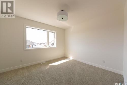 211 Flynn Bend, Saskatoon, SK - Indoor Photo Showing Other Room