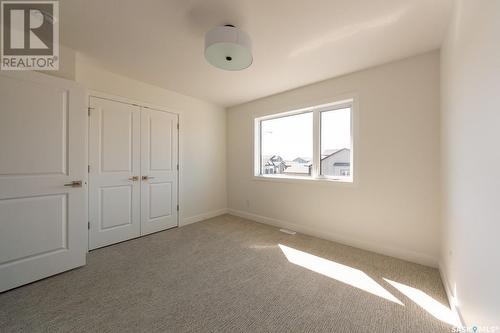 211 Flynn Bend, Saskatoon, SK - Indoor Photo Showing Other Room