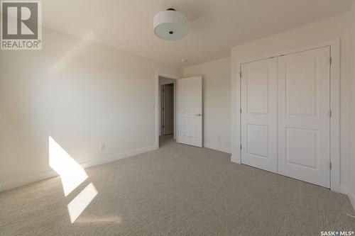 211 Flynn Bend, Saskatoon, SK - Indoor Photo Showing Other Room