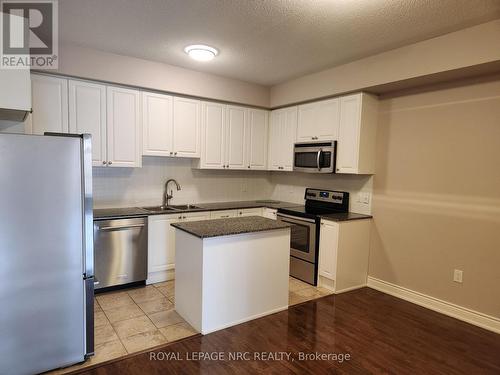 328 - 8111 Forest Glen Drive, Niagara Falls (208 - Mt. Carmel), ON - Indoor Photo Showing Kitchen