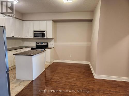 328 - 8111 Forest Glen Drive, Niagara Falls (208 - Mt. Carmel), ON - Indoor Photo Showing Kitchen