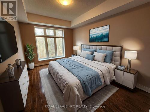 328 - 8111 Forest Glen Drive, Niagara Falls (208 - Mt. Carmel), ON - Indoor Photo Showing Bedroom