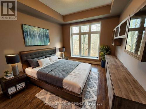 328 - 8111 Forest Glen Drive, Niagara Falls (208 - Mt. Carmel), ON - Indoor Photo Showing Bedroom