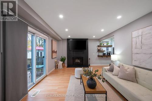 120 Four Oaks Crescent, London, ON - Indoor Photo Showing Living Room With Fireplace