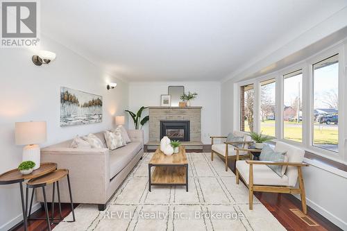 1112 Kennedy Drive, Fort Erie (334 - Crescent Park), ON - Indoor Photo Showing Living Room With Fireplace