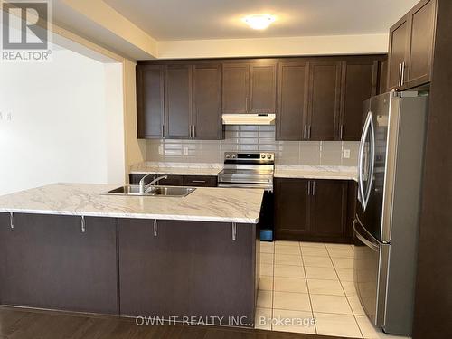 28 Donald Ficht Crescent, Brampton, ON - Indoor Photo Showing Kitchen With Double Sink With Upgraded Kitchen