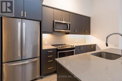 131 - 8 Nahani Way, Mississauga, ON - Indoor Photo Showing Kitchen With Upgraded Kitchen