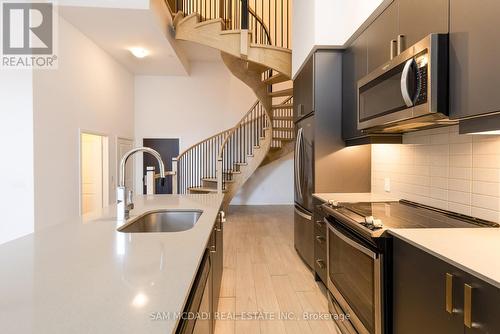 131 - 8 Nahani Way, Mississauga, ON - Indoor Photo Showing Kitchen