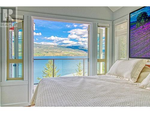 7016 Barcelona Drive Unit# 6, Kelowna, BC - Indoor Photo Showing Bedroom With Body Of Water