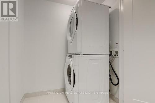 321 - 118 Merchants Wharf Avenue, Toronto, ON - Indoor Photo Showing Laundry Room