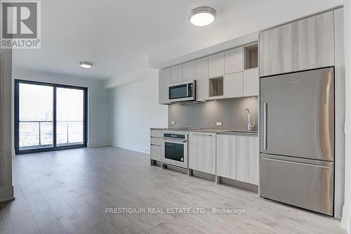 321 - 118 Merchants Wharf Avenue, Toronto, ON - Indoor Photo Showing Kitchen With Stainless Steel Kitchen