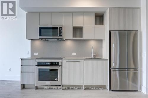 321 - 118 Merchants Wharf Avenue, Toronto, ON - Indoor Photo Showing Kitchen With Stainless Steel Kitchen