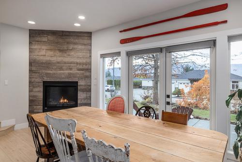 11527 Lang Court, Lake Country, BC - Indoor Photo Showing Dining Room With Fireplace