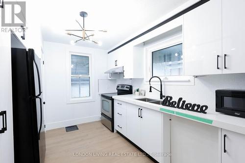 757 Fleet Street, London, ON - Indoor Photo Showing Kitchen With Double Sink