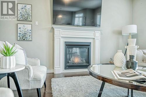 96 Bridlewood Boulevard, Whitby, ON - Indoor Photo Showing Living Room With Fireplace