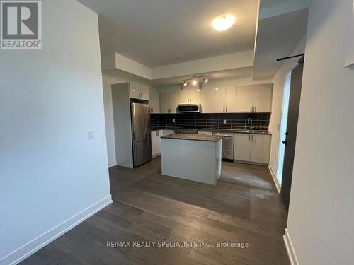 143 - 1075 Douglas Mccurdy Comm Court, Mississauga, ON - Indoor Photo Showing Kitchen