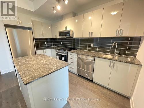 143 - 1075 Douglas Mccurdy Comm Court, Mississauga, ON - Indoor Photo Showing Kitchen With Stainless Steel Kitchen With Upgraded Kitchen