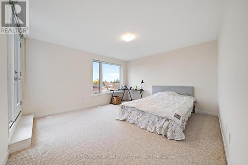 11 - 4080 Parkside Village Drive, Mississauga, ON - Indoor Photo Showing Bedroom