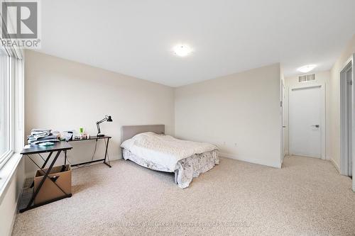 11 - 4080 Parkside Village Drive, Mississauga, ON - Indoor Photo Showing Bedroom