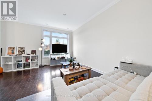 11 - 4080 Parkside Village Drive, Mississauga, ON - Indoor Photo Showing Living Room