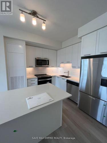 702 - 385 Winston Road, Grimsby, ON - Indoor Photo Showing Kitchen With Stainless Steel Kitchen With Double Sink