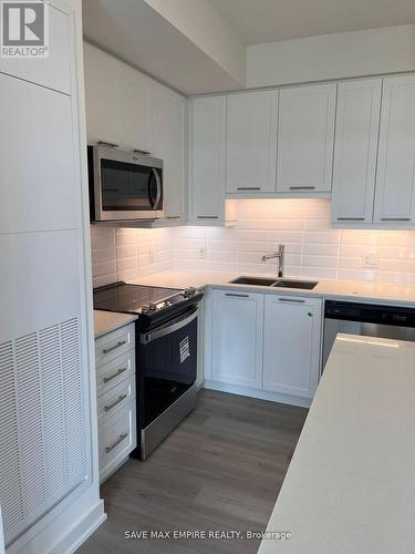 702 - 385 Winston Road, Grimsby, ON - Indoor Photo Showing Kitchen With Double Sink With Upgraded Kitchen