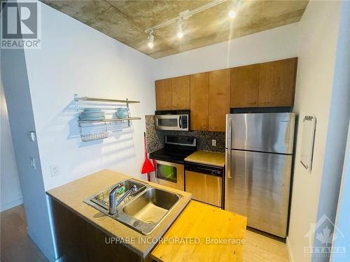 1405 - 179 George Street, Ottawa, ON - Indoor Photo Showing Kitchen With Double Sink