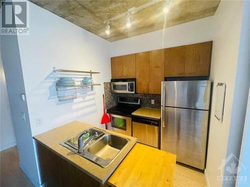 179 George Street Unit#1405, Ottawa, ON - Indoor Photo Showing Kitchen With Double Sink