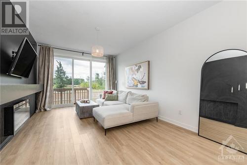 42 Riddell Street, Carleton Place, ON - Indoor Photo Showing Living Room With Fireplace